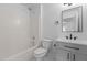 Clean bathroom featuring shower-tub, toilet, and vanity at 1349 Crabtree Blvd, Raleigh, NC 27610