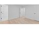 Bright bedroom featuring hard surface flooring, natural light, and ensuite bathroom at 1349 Crabtree Blvd, Raleigh, NC 27610