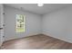 Bright bedroom featuring hard surface flooring and natural light at 1349 Crabtree Blvd, Raleigh, NC 27610