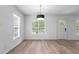 Bright living room featuring hard surface flooring and natural light at 1349 Crabtree Blvd, Raleigh, NC 27610