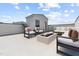 Relaxing rooftop terrace with comfortable seating around a modern fire pit feature and great view at 138 North White St # 200, Wake Forest, NC 27587