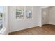 Bright room with wood floors and large windows overlooking the neighborhood at 1408 South St, Durham, NC 27707