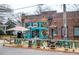 Exterior of a local business with outdoor seating and a vibrant storefront with ample sunlight at 1431 Courtland Dr, Raleigh, NC 27604