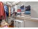 Organized walk-in closet with custom shelving and ample storage for clothing and shoes at 1431 Courtland Dr, Raleigh, NC 27604