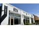 Modern commercial building featuring large windows and prominent signage for 'BEER' and 'FOOD' at 1431 Courtland Dr, Raleigh, NC 27604