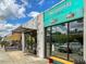 Exterior daytime view of Two Roosters Ice Cream storefront with outdoor seating and street parking at 1431 Courtland Dr, Raleigh, NC 27604