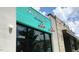Vibrant commercial space featuring a teal awning and red industrial-style lighting fixtures at 1431 Courtland Dr, Raleigh, NC 27604