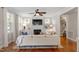 Cozy living room featuring a fireplace with built-ins, hardwood floors, and comfortable seating at 1431 Courtland Dr, Raleigh, NC 27604