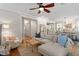 Open-concept living room showcases hardwood floors, neutral tones, and seamless flow to the kitchen and dining area at 1431 Courtland Dr, Raleigh, NC 27604