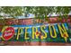 Close-up of a colorful mural that reads, 