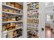 Walk-in pantry with custom shelving providing ample storage at 1431 Courtland Dr, Raleigh, NC 27604