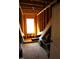 Unfinished attic space with exposed wooden beams, potential for storage or customization at 145 Plantation Dr, Youngsville, NC 27596