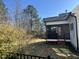 Exterior view of a screened in porch at 145 Plantation Dr, Youngsville, NC 27596