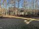 View of backyard and trees at 145 Plantation Dr, Youngsville, NC 27596