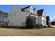 Charming two-story home with manicured landscaping and an attached two-car garage at 145 Plantation Dr, Youngsville, NC 27596