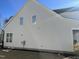 View of the light gray siding on the side of the house at 145 Plantation Dr, Youngsville, NC 27596