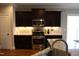Close up of kitchen with stainless steel appliances and granite countertops at 145 Plantation Dr, Youngsville, NC 27596