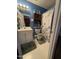 Bright bathroom featuring a vanity with storage, seashell accents, and a starfish-themed shower curtain at 1454-17 Cimarron Pkwy, Wake Forest, NC 27587