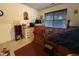 Cozy bedroom featuring a large bed and window with blinds, offering comfort and natural light at 1454-17 Cimarron Pkwy, Wake Forest, NC 27587