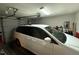 Spacious garage with a white van inside, offering ample parking and storage space at 1454-17 Cimarron Pkwy, Wake Forest, NC 27587