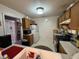 Bright kitchen showcasing abundant cabinet space, essential appliances, and lots of counter space at 1454-17 Cimarron Pkwy, Wake Forest, NC 27587