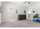 Bedroom with a dresser and a view into the bathroom and hallway at 1520 Banks Brooke Dr, Raleigh, NC 27603
