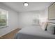 Bedroom with sunlit windows at 1613 Kilmer Ter, Durham, NC 27703