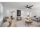 Stylish living room filled with natural light, showcasing a spacious area with modern decor and comfortable seating at 1613 Kilmer Ter, Durham, NC 27703