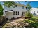 Spacious backyard with a deck, patio, storage shed and mature trees at 2 Great Oak Ct, Durham, NC 27713