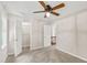Bedroom featuring neutral walls, carpet, ceiling fan and walk-in closet at 2 Great Oak Ct, Durham, NC 27713