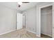 Bedroom with neutral walls, carpet, closet and a view to another bedroom at 2 Great Oak Ct, Durham, NC 27713