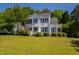 Charming two-story home with landscaped yard and beautiful curb appeal on a sunny day at 2 Great Oak Ct, Durham, NC 27713