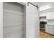 Pantry with sliding barn door and wire rack shelving at 2 Great Oak Ct, Durham, NC 27713