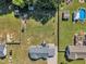 Aerial view showcases the large backyard with garden beds and the surrounding landscape at 2006 Woodstone Dr, Archer Lodge, NC 27527
