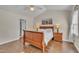 Charming bedroom with vaulted ceiling, ceiling fan, and natural light creating a tranquil atmosphere at 2006 Woodstone Dr, Archer Lodge, NC 27527