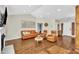 Cozy living room offers vaulted ceiling, fireplace, and hardwood floors throughout. Perfect for entertaining guests at 2006 Woodstone Dr, Archer Lodge, NC 27527