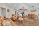 Spacious living room boasts an open floor plan with hardwood floors, modern lighting, and comfortable seating at 2006 Woodstone Dr, Archer Lodge, NC 27527