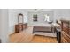 Bright bedroom with hardwood floors and lots of natural light at 2018 Waterton Ln, Apex, NC 27502