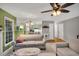 Comfortable living room with neutral tones, plush seating, and easy access to the kitchen at 2018 Waterton Ln, Apex, NC 27502