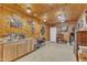 Finished basement featuring a sink, workspace, and ample display shelving at 202 Reeder Branch Dr, Clayton, NC 27520