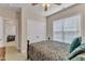 Comfortable bedroom featuring neutral walls and carpeted floor, with a closet for ample storage solutions at 202 Reeder Branch Dr, Clayton, NC 27520