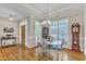 Bright dining room with a chandelier and many windows at 202 Reeder Branch Dr, Clayton, NC 27520