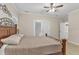 Cozy main bedroom featuring a comfortable bed, soft lighting, and a peaceful ambiance at 202 Reeder Branch Dr, Clayton, NC 27520