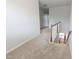 Hallway features carpet and painted walls with access to bedrooms and other living spaces at 204 Stockton Gorge Rd. Rd, Morrisville, NC 27560