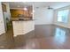 Modern kitchen featuring stainless steel appliances, breakfast bar, and an open layout leading into the living space at 204 Stockton Gorge Rd. Rd, Morrisville, NC 27560