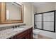 Bathroom with granite countertop, a bowl sink, and tiled shower with glass doors at 208 Willowbend Ln, Hillsborough, NC 27278