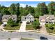 Charming two-story home with a well-kept front lawn, complimented by mature trees at 208 Willowbend Ln, Hillsborough, NC 27278