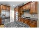 Close up of the kitchen featuring stainless steel appliances and granite countertops at 208 Willowbend Ln, Hillsborough, NC 27278