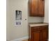 Functional laundry room with cabinets, countertop space, and washer/dryer hookups at 208 Willowbend Ln, Hillsborough, NC 27278