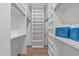 Organized walk-in closet with built-in shelving and ample storage space for clothing and accessories at 2104 Manuel St, Raleigh, NC 27612
